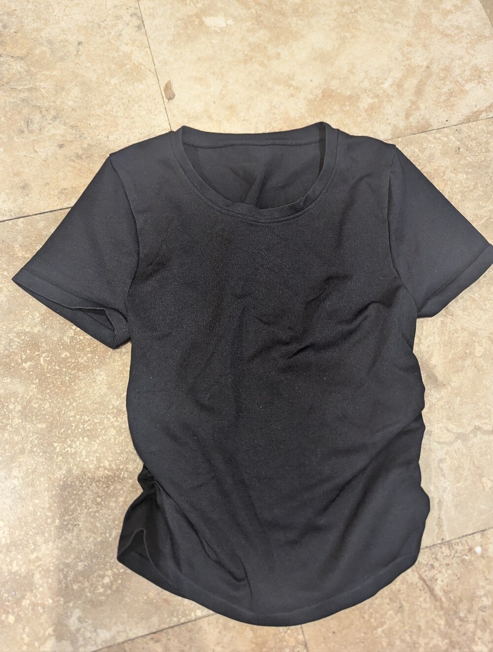 Cute and versatile black fitted short-sleeve top by OQQ. Made from a stretchy,